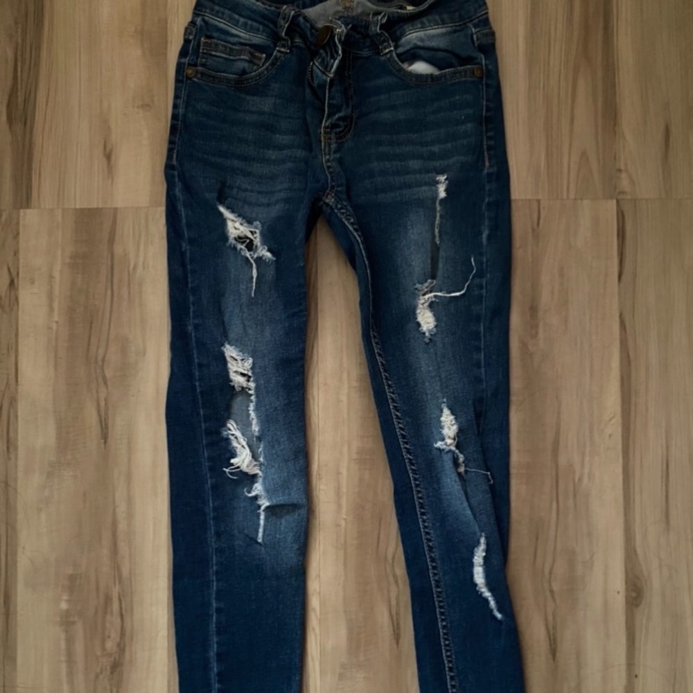 Ripped blue jeans